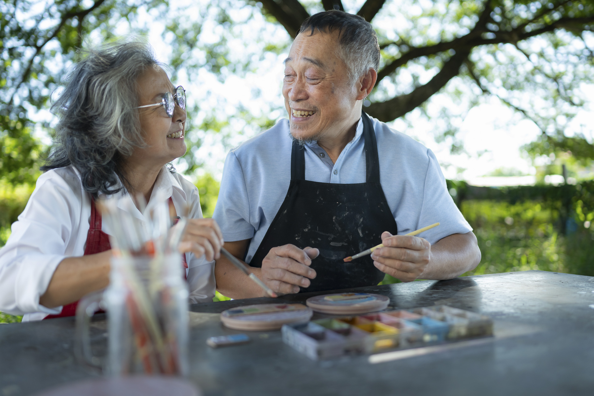 Caregiver sharing a warm, connected moment with a senior woman