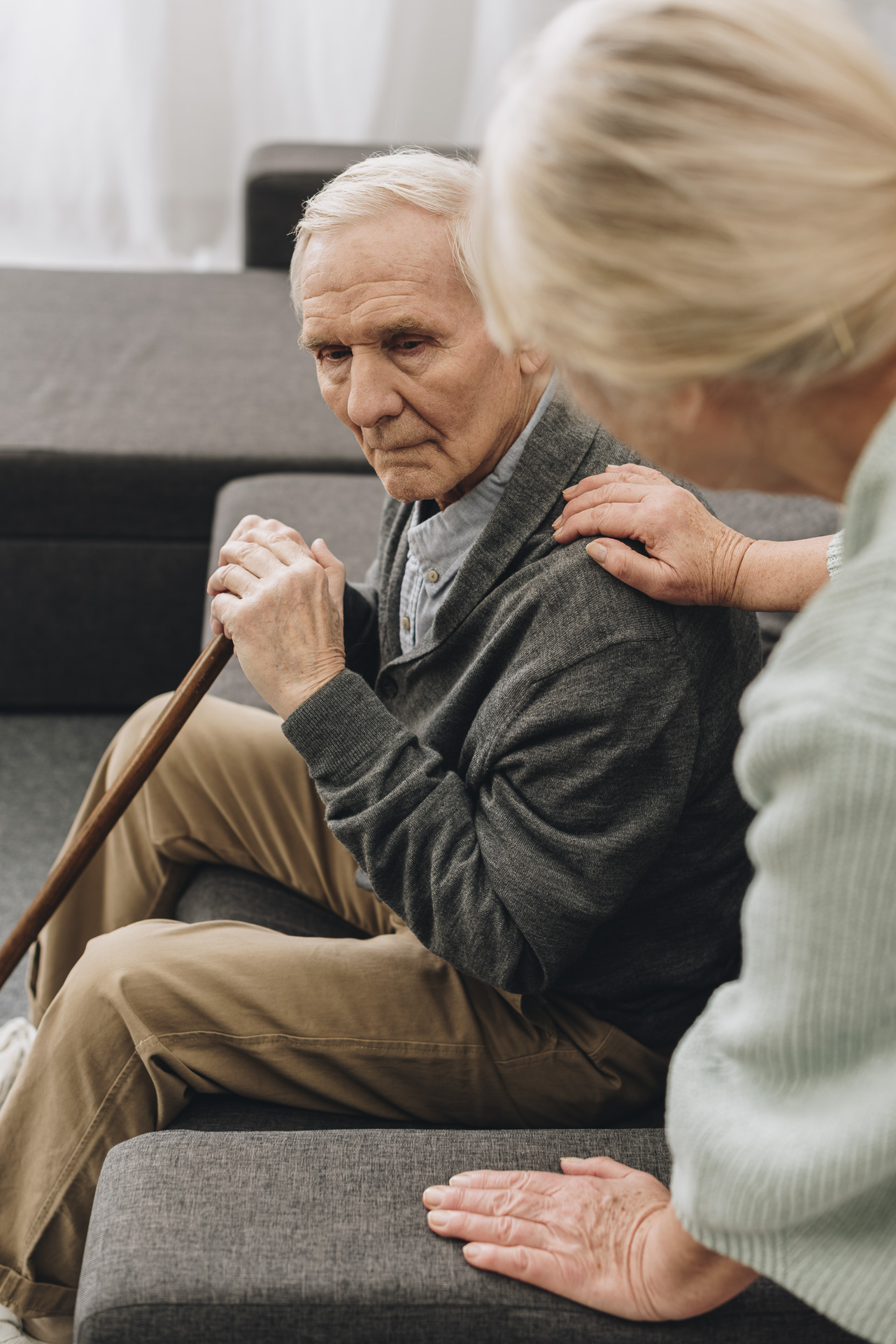 Caregiver sitting with an older adult